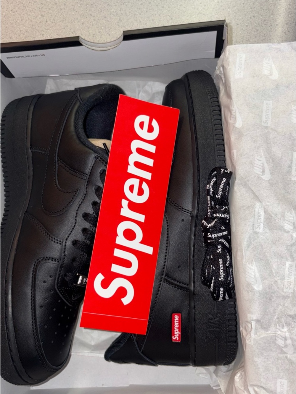 Supreme Black Leather Sneakers with Red Logo Sticker